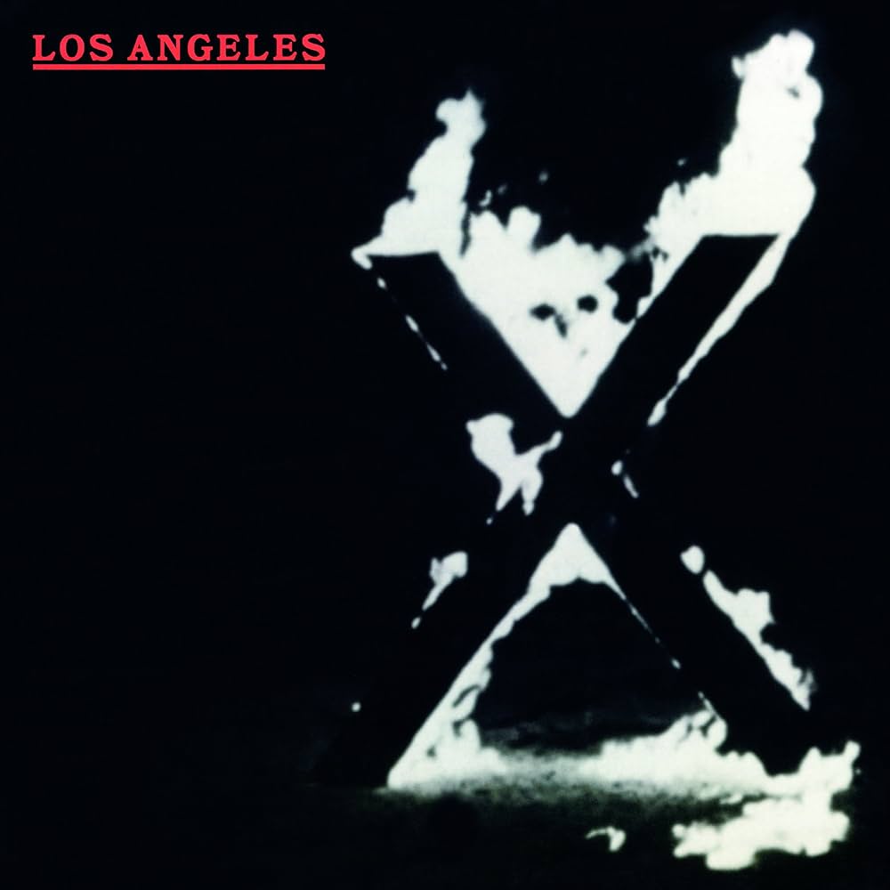 X – The World’s a Mess: It’s in My&nbsp;Kiss